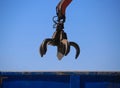 Close-up of industrial claw machine. Arm excavator, crane claw empty.