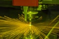 Close up Industrial laser and plasma cutting of steel sheet or metal sheet with sparks fly Royalty Free Stock Photo