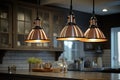 close-up of industrial pendant lights hanging over a kitchen island