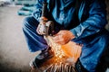 industrial workers hands cutting iron with angle grinder