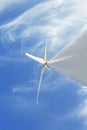 An electric wind turbine on a sky background. Windmill farms. Wind power. Renewable energy sources concept. Copy space. Royalty Free Stock Photo