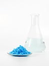 Close up inorganic chemical on white laboratory table. CopperII sulfate Royalty Free Stock Photo