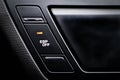 Close up inside car, button to disable traction control Royalty Free Stock Photo