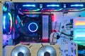 Inside Desktop PC Gaming and Cooling Fan CPU system with multicolored LED RGB light show status on working