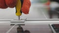 Close-up Installation, Connection and mounting of solar panels. Workers fasten solar panels. Technicians installing Royalty Free Stock Photo