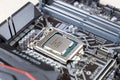 Close-up of an Intel i7-9700K processor installed in socket 1151 on a Gigabyte motherboard. Assembly and upgrade desktop Royalty Free Stock Photo