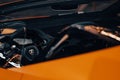 Close-up of an interior of a sleek, orange Lamborghini