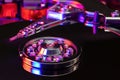 Close-up of the internals of a hard drive Illuminated by colored Royalty Free Stock Photo