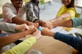 Close up of international students hands fist bump Royalty Free Stock Photo