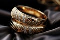 Close-up of intertwined fingers wearing matching rings - stock photography concepts