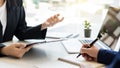 Close-up interviewers apply for jobs at the conference room in the office where job applicants are filling out resumes