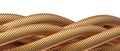 Close-up of interwoven golden metallic cables Royalty Free Stock Photo