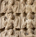 Close up of intricate carvings of Angels on Arles cathedral, France