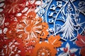 close-up of intricate diwali-themed paper cuttings