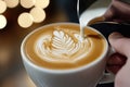 Close-up of intricate latte art pouring in a cup Royalty Free Stock Photo