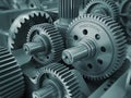 Close up of intricate metal gears meshing together in a complex machine Royalty Free Stock Photo