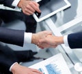 Close up. investor and businessman shaking hands Royalty Free Stock Photo