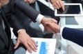 Close up. investor and businessman shaking hands Royalty Free Stock Photo