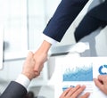 Close up. investor and businessman shaking hands Royalty Free Stock Photo