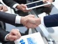 Close up. investor and businessman shaking hands Royalty Free Stock Photo