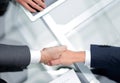 Close up. investor and businessman shaking hands Royalty Free Stock Photo