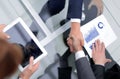 Close up. investor and businessman shaking hands Royalty Free Stock Photo