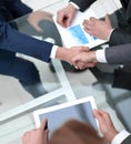 Close up. investor and businessman shaking hands Royalty Free Stock Photo