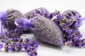 Close up of isolated bagged dried lavender blossom sacs used as moth repellent in wardrobe for clothes protection, white Royalty Free Stock Photo