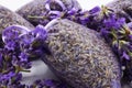 Close up of isolated bagged dried lavender blossom sacs used as moth repellent in wardrobe for clothes protection, white Royalty Free Stock Photo