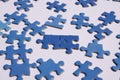 Close up of isolated blue puzzle pieces, white background Royalty Free Stock Photo