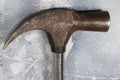 Close up of isolated hammer on cement background