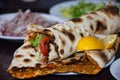 Isolated lahmacun, turkish pizza with vegetable served on plate Royalty Free Stock Photo