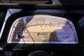 Close up of isolated old dusty tachometer inside classic French cult car 2CV