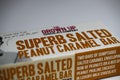 Close up of isolated package of the grown up chocolate company superb salted peanut caramel bar