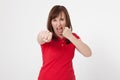 Close up isolated portrait of annoyed angry woman. Red blank T-shirt and brunette hair front view. Negative human emotions