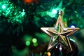 Close up isolated star on christams tree Royalty Free Stock Photo