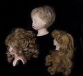 Close Up and Isolated Vintage Antique Old Doll Heads Royalty Free Stock Photo