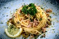 Close up Italian pasta with tuna fish olive and lemon Royalty Free Stock Photo