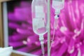 Close up IV saline solution drip for patient Royalty Free Stock Photo