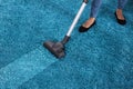 Janitor Using Vacuum Cleaner For Cleaning Carpet Royalty Free Stock Photo