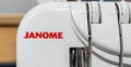 Close-up of Janome brand logo on a sewing machine. Minsk, Belarus, 2023 Royalty Free Stock Photo