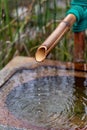 Close up of a japanese bamboo fountain Royalty Free Stock Photo