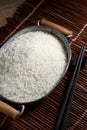 Close up Japanese rice in measuring cup on table Royalty Free Stock Photo