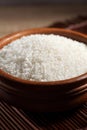 Close up Japanese rice in measuring cup on table Royalty Free Stock Photo