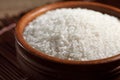 Close up Japanese rice in measuring cup on table Royalty Free Stock Photo