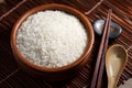 Close up Japanese rice in measuring cup on table Royalty Free Stock Photo