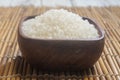 Close up of japanese rice in a wooden cup. Royalty Free Stock Photo