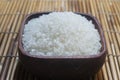Close up of japanese rice in a wooden cup. Royalty Free Stock Photo