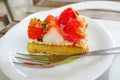 Close up japanese strawberry tart on white plate background. Royalty Free Stock Photo