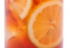 Close up jar glass of iced tea with lemons, isolated on a white Royalty Free Stock Photo